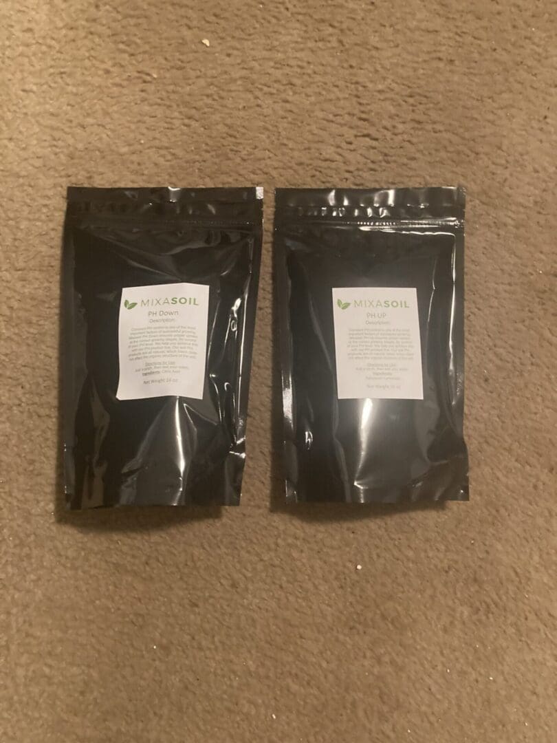 Two bags of black powder on the floor